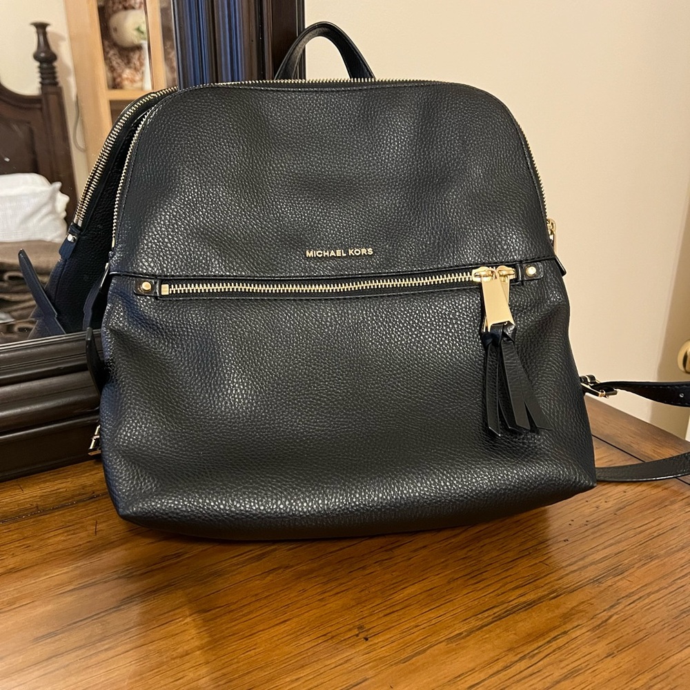 Rhea Medium Slim Leather Backpack